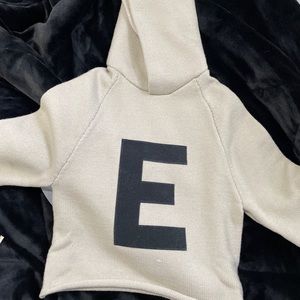 Fear of god essentials kids big e hoodie “wheat”